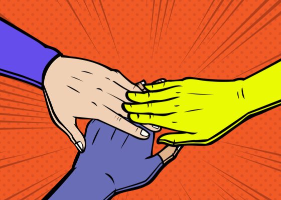 Retro style cartoon image. Orange background with three superhero hands (one pink flesh, one yellow, one blue) touching each other in the centre of the picture. Some lines in the background to indicate motion.