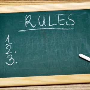 Black board with the heading Rules and 1, 2, and 3 below.